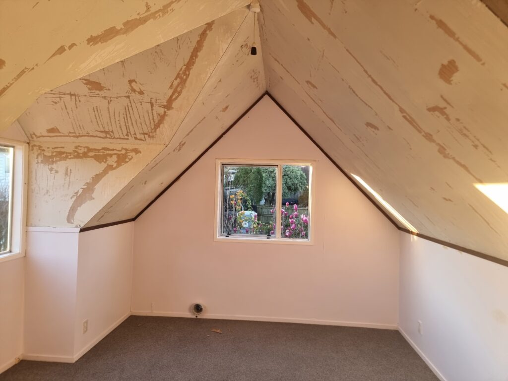 Asbestos texture was applied to ceilings and walls. Photo of the ceiling walls post asbestos texture removal. All sharp angles and odd wall shapes make this a technically difficult job. 