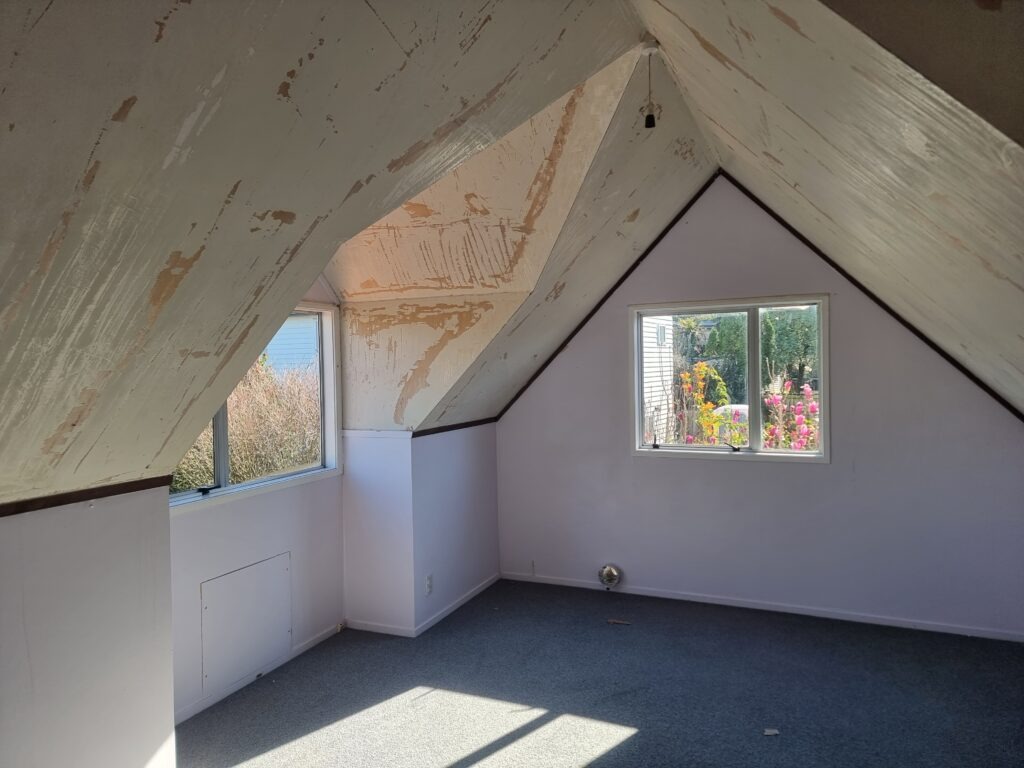 Asbestos texture was applied to ceilings and walls. Photo of the ceiling walls post asbestos texture removal. 