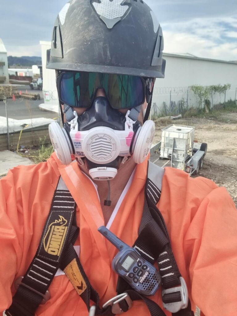 Hazard Pro asbestos removal technicians in protective gear, available for urgent site enquiries.