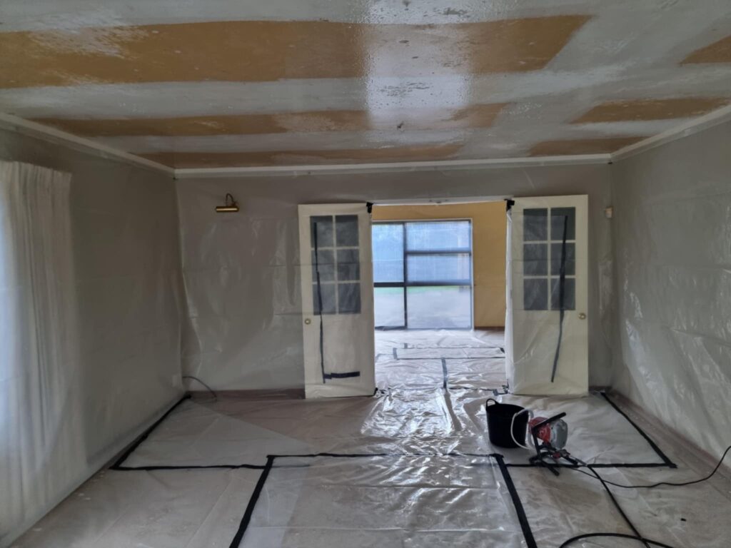 Sealed containment area used for ceiling asbestos removal project.